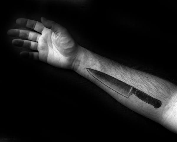 Man With Inner Forearm Tattoo Design Of Chef Knife