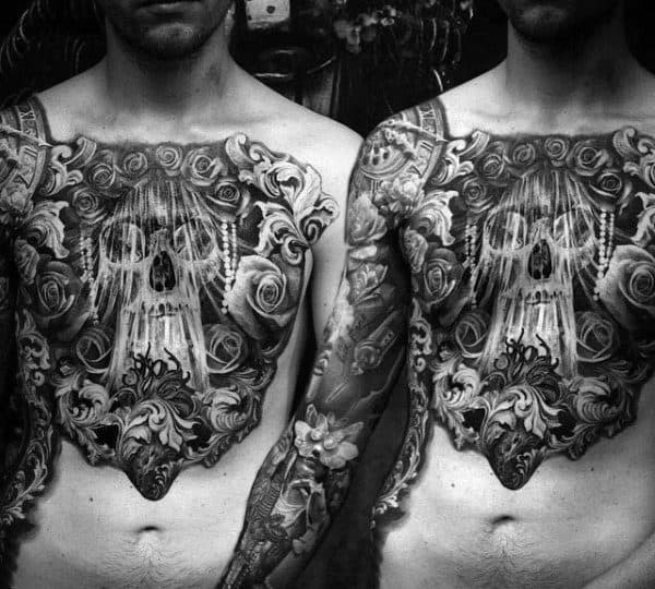 Man With Insane Black Ink Skull Chest Tattoos