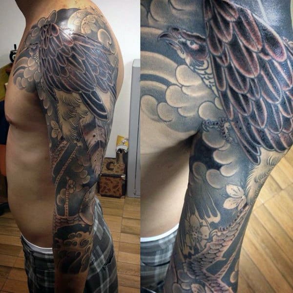 Man With Large Feathered Hawk Full Sleeve Tattoo