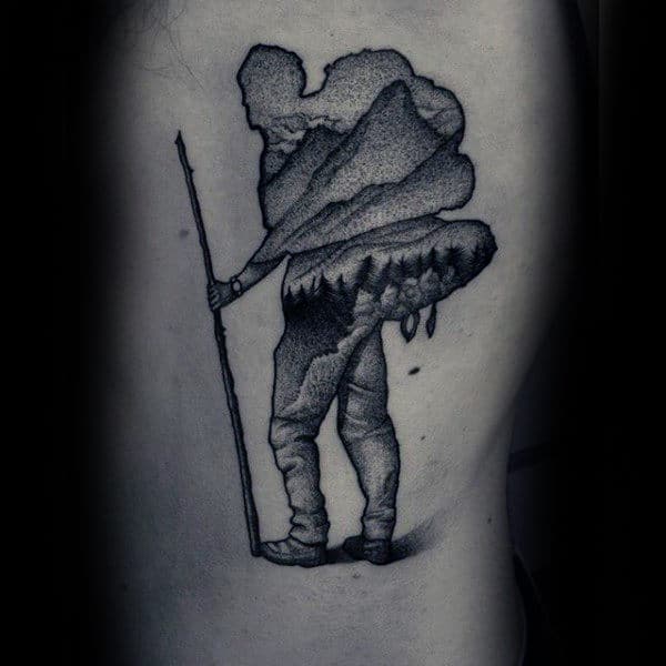 Man With Large Load On His Back Dotwork Tattoo On Forearms