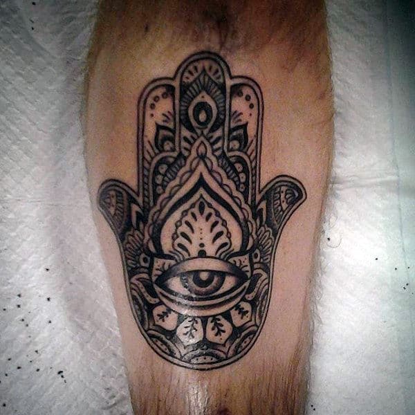 Man With Leg Hamsa Tattoo