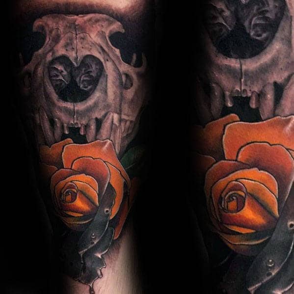 Man With Lion Skull Orange Rose Flower Forearm Tattoo