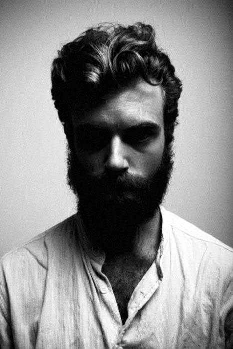 Man With Long And Curly Haircut