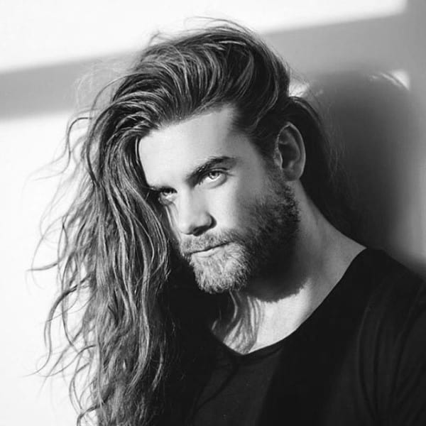 Man With Long Length Surfer Hair