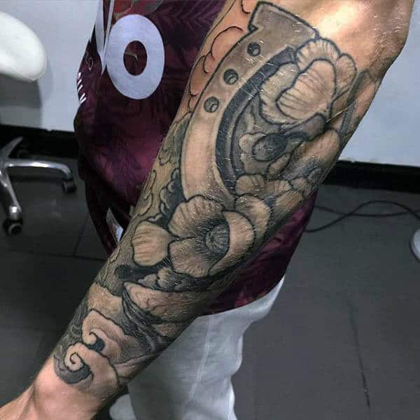 Man With Lucky Horseshoe And Poppies Half Sleeve Tattoo