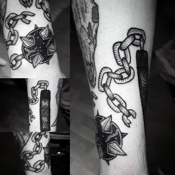 Black ink mace tattoo featuring a spiked ball on a heavy chain with a wooden handle, symbolizing strength, resilience, and medieval warfare.