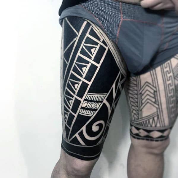 Man With Maori Tattoos On Upper Leg Thighs