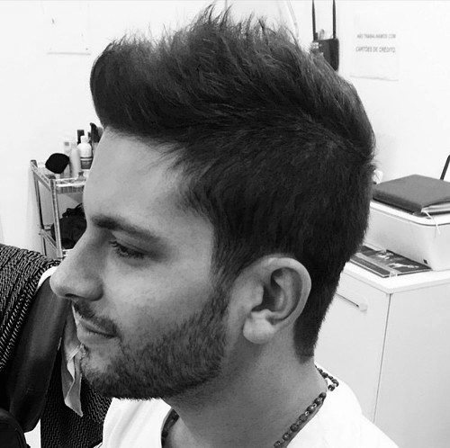 Man With Messy Faux Hawk Hairstyle