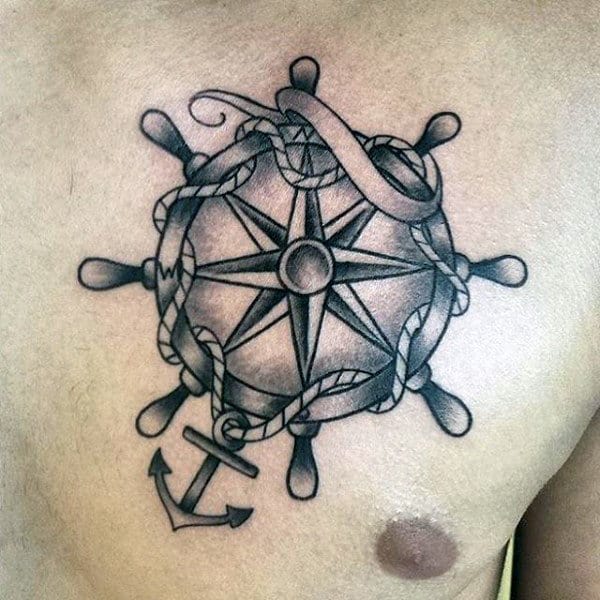 Man With Nautical Ship Wheel Themed Chest Tattoo