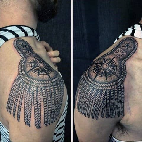 Man With Nautical Star Captian Shoulder Tattoo