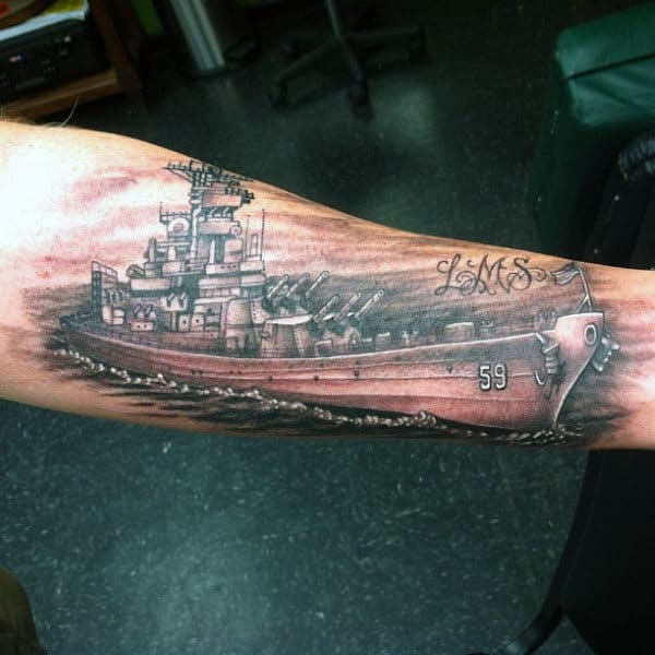 Man With Navy Ship Forearm Tattoos