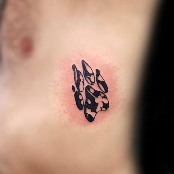 Man With Negative Space Black Ink Dog Paw Rib Cage Side Tattoo