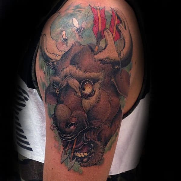Man With New School Moose With Arrows Upper Arm Tattoo