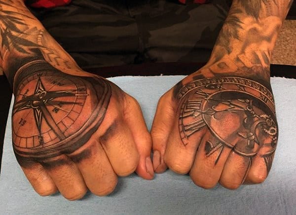 Man With Nordic Compass Tattoo On His Hands