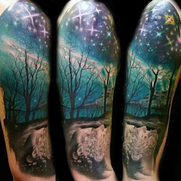 Man With Northern Lights Sleeve Tattoo