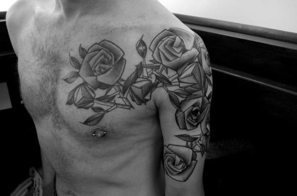 Man With Origami Rose Flowers Chest And Arm Tattoo