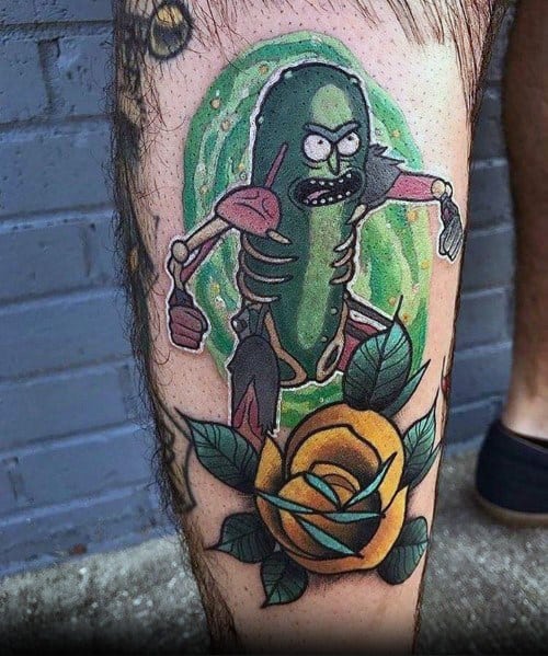 Pickle Rick cyborg tattoo with a green portal background and a bold yellow rose, blending sci-fi and traditional tattoo styles on the leg.