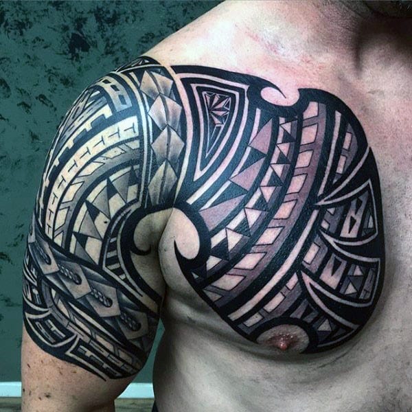 Man With Polynesian Chest Tattoo