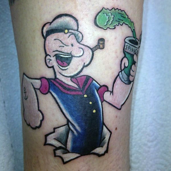 Man With Popeye Spinach Arm Tattoo