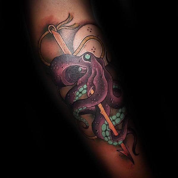 Man With Purple Kraken Needle And Thread Forearm Tattoo
