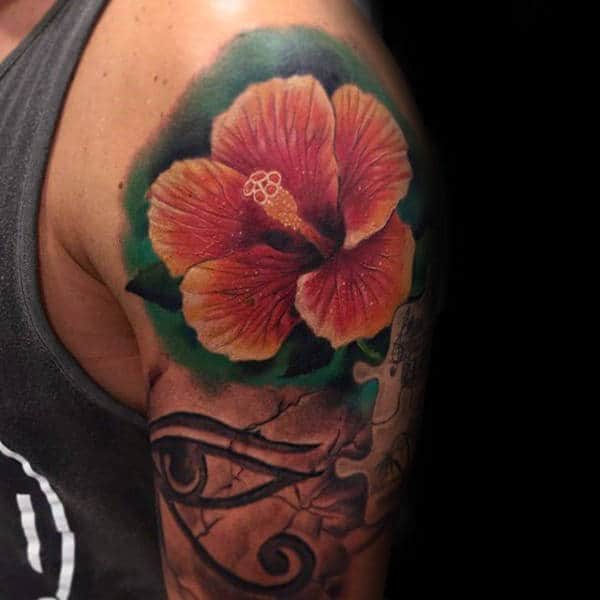 Man With Realistic Hibiscus Flower Tattoo On Upper Arm