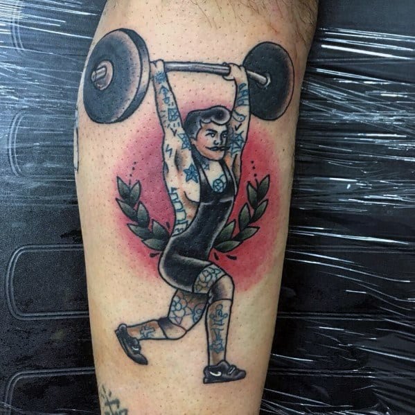 Traditional-style tattoo of a strongwoman performing an overhead lift, featuring bold lines, vibrant colors, and laurel leaves, symbolizing strength and empowerment.
