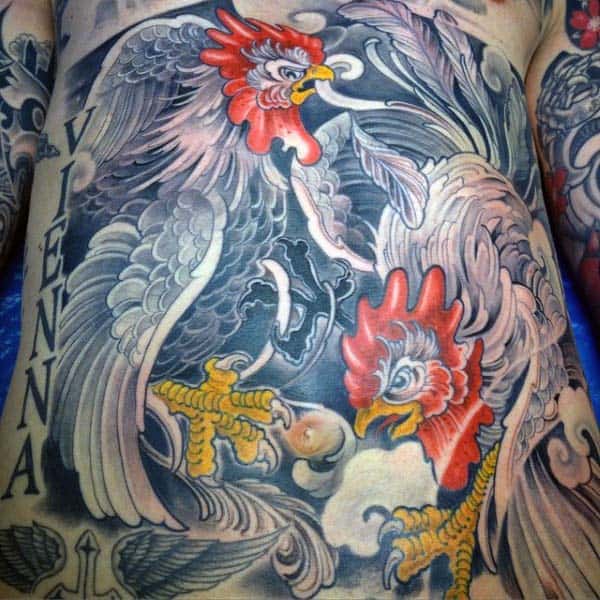 Man With Rooster Tattoo On Chest In Traditional Style