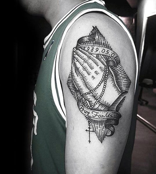 Man With Rosary Beads Tattoos On Upper Arm Old School Design Inspiration