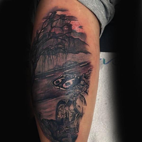 Man With Route 66 Biker Leg Tattoo