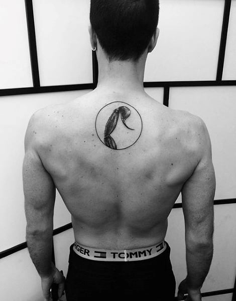 Man With Scorpion Stinger Circle Back Tattoo