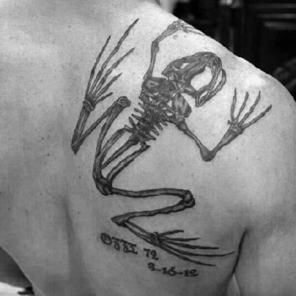 Man With Shoulder Tattoo Of Navy Seal Bone Frog Design