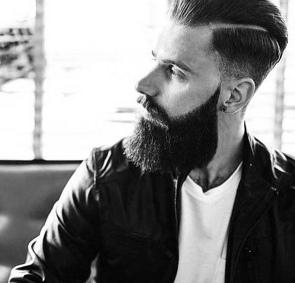 Man With Simple Hard Part Hairstyle And Low Fade