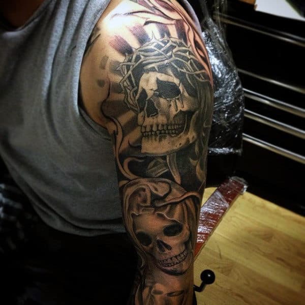 Man With Skull Sleeve Tattoo Thorn Crown Design