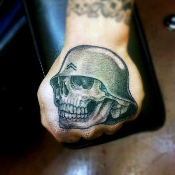 Man With Skull Wearing Army Helmet Tattoo On Hands