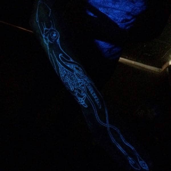 Man With Squid Glow In The Dark Tattoo Sleeve