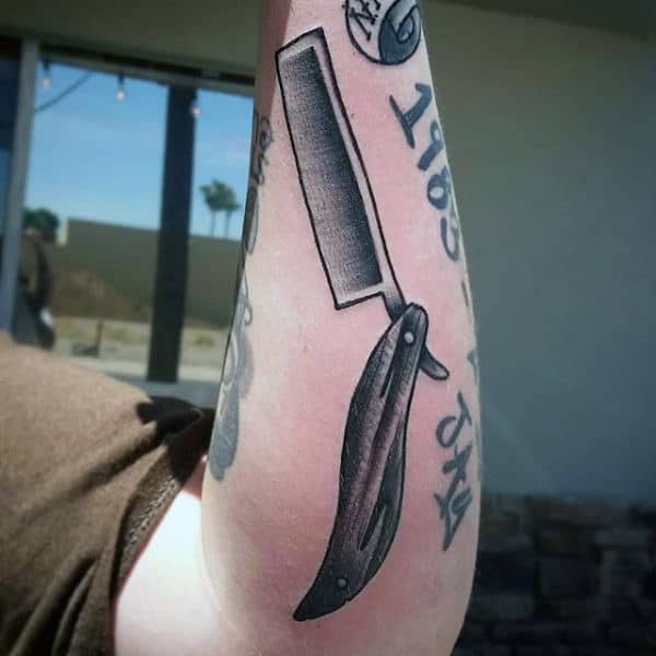 Man With Straight Razor Barber Tattoos