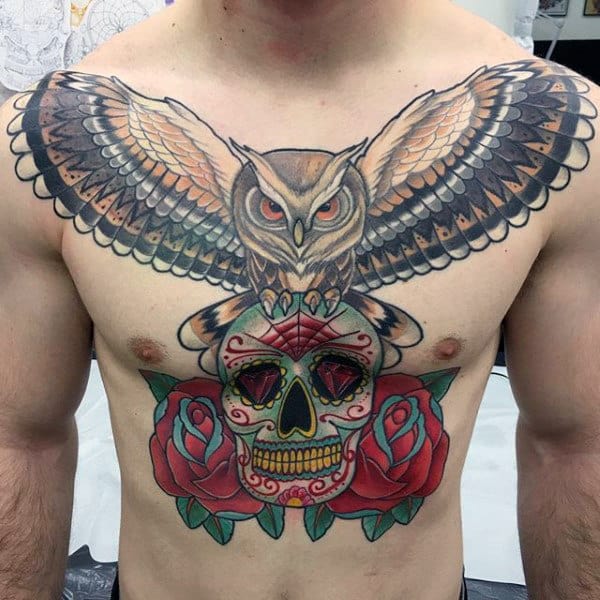 Man With Sugar Skull Tattoo On Chest With Owl And Roses
