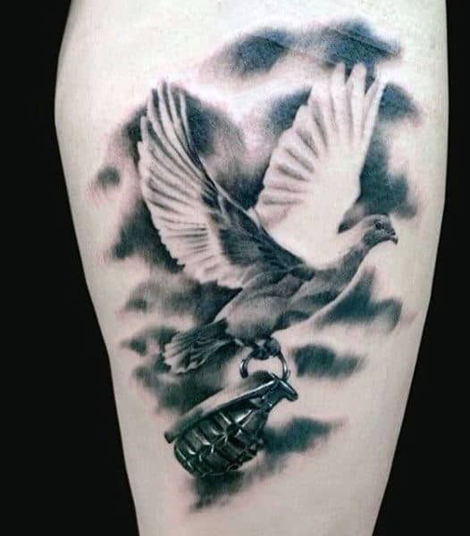 Man With Tattoo Of Bird Carrying Grenade