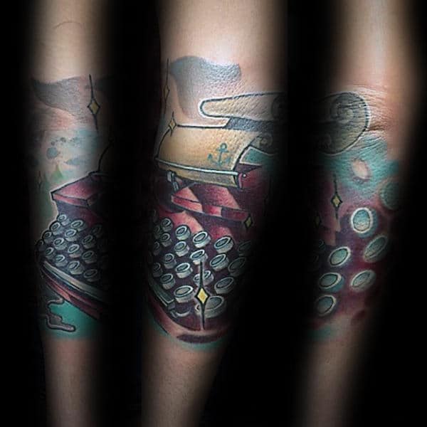 Man With Tattoo Of New School Typewriter On Outer Forearm