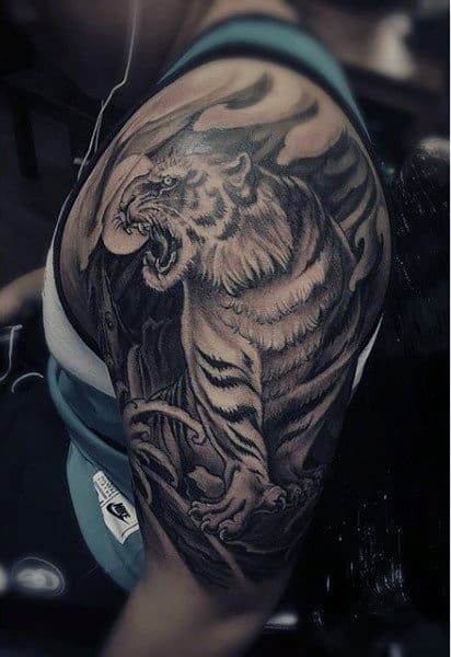Man With Tiger Tattoo Arm