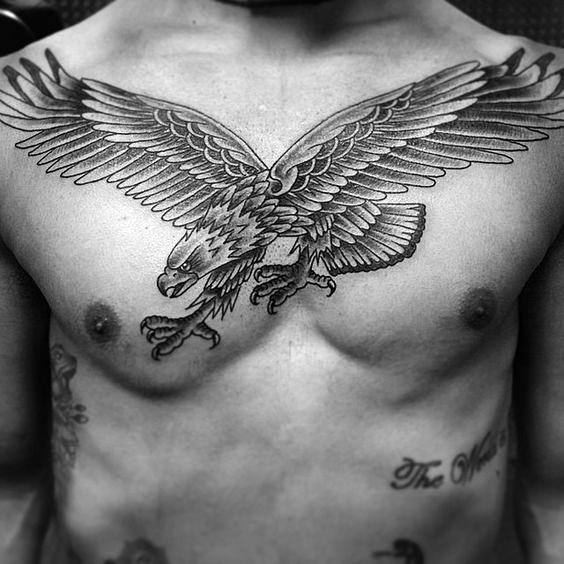 Man With Traditional Eagle Tattoo On Chest