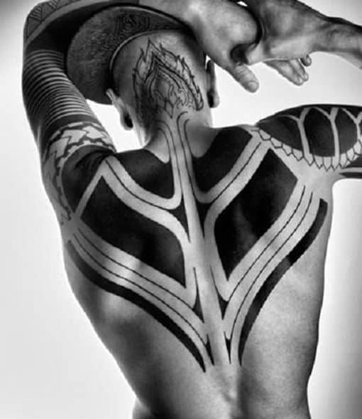 Man With Tribal Back Shoulder Tattoo