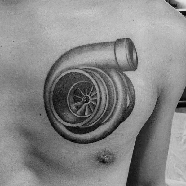 Realistic turbocharger tattoo on the chest with fine shading and metallic detailing, symbolizing speed, power, and a passion for automotive performance.