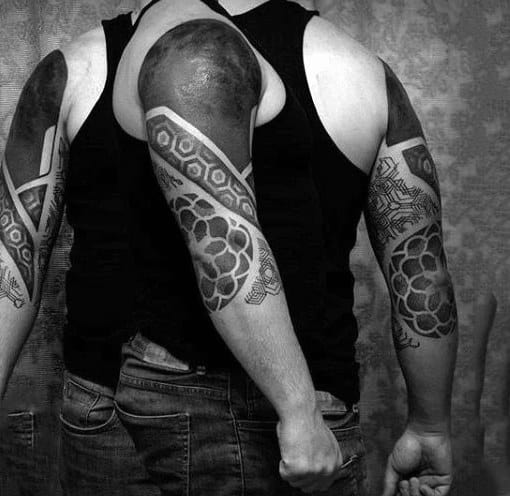 Man With Upper Arm Half Sleeve Blackwork Tattoo Design