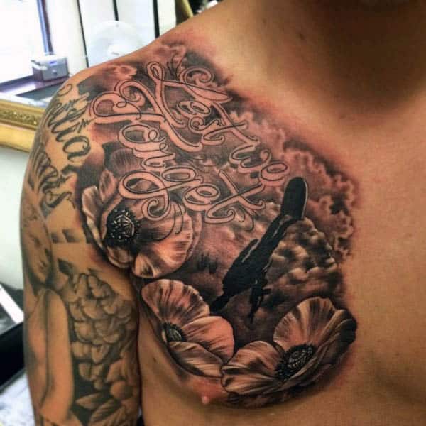 Man With Upper Chest Grave And Poppy Flowers Tattoo Lest We Forget