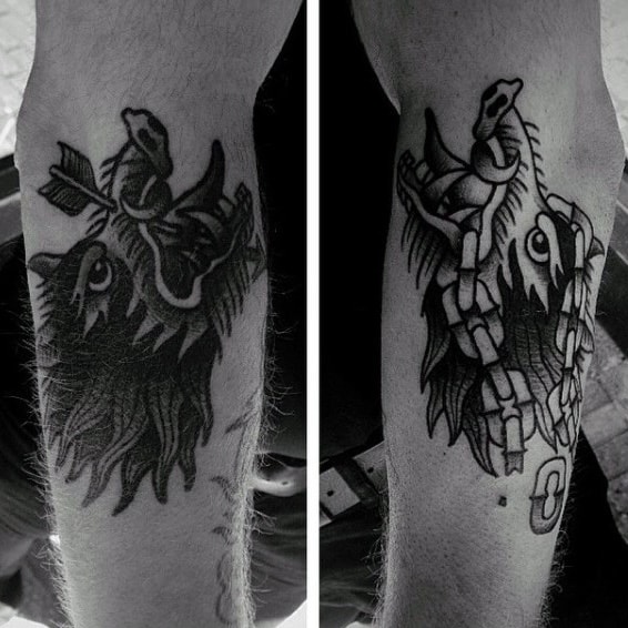 Man With Vintage Boar Tattoos On Forearms