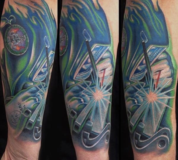 Man With Welding Forearm Tattoo Design