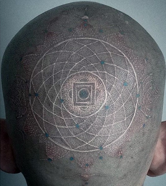 Man With White Ink Back Of Head Circular Tattoo Design