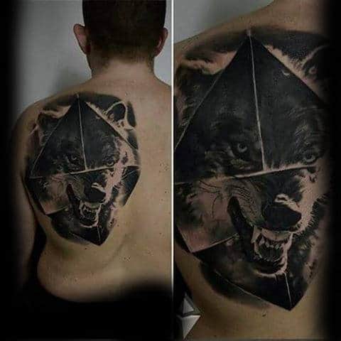 Man With Wolf Animal Back Tattoo Abstract Design