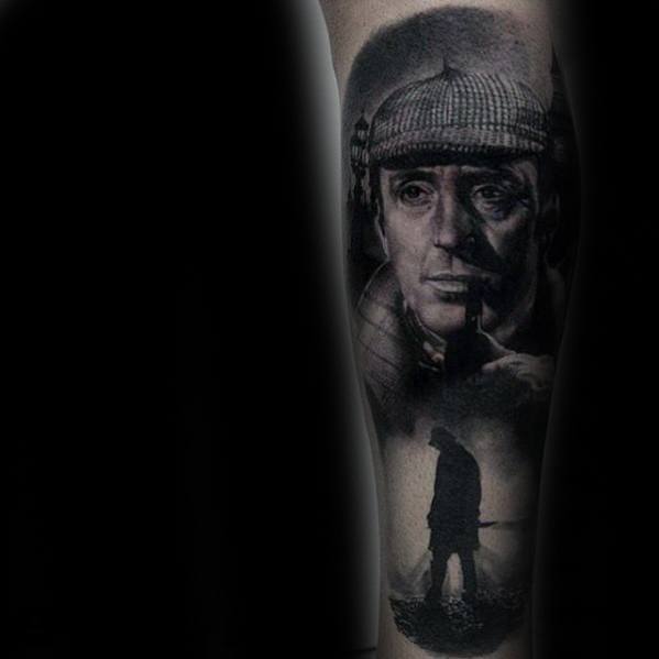Tattoo of Sherlock Holmes in a hat with a pipe, and a silhouette of a person against a black background